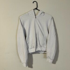 White garage jacket, cropped size medium.